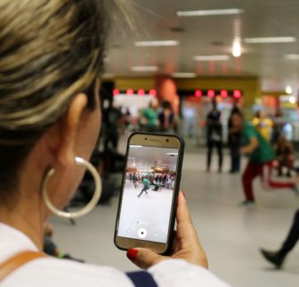 Interactive dancing and pedaling for juice get passengers to move about in Luz station